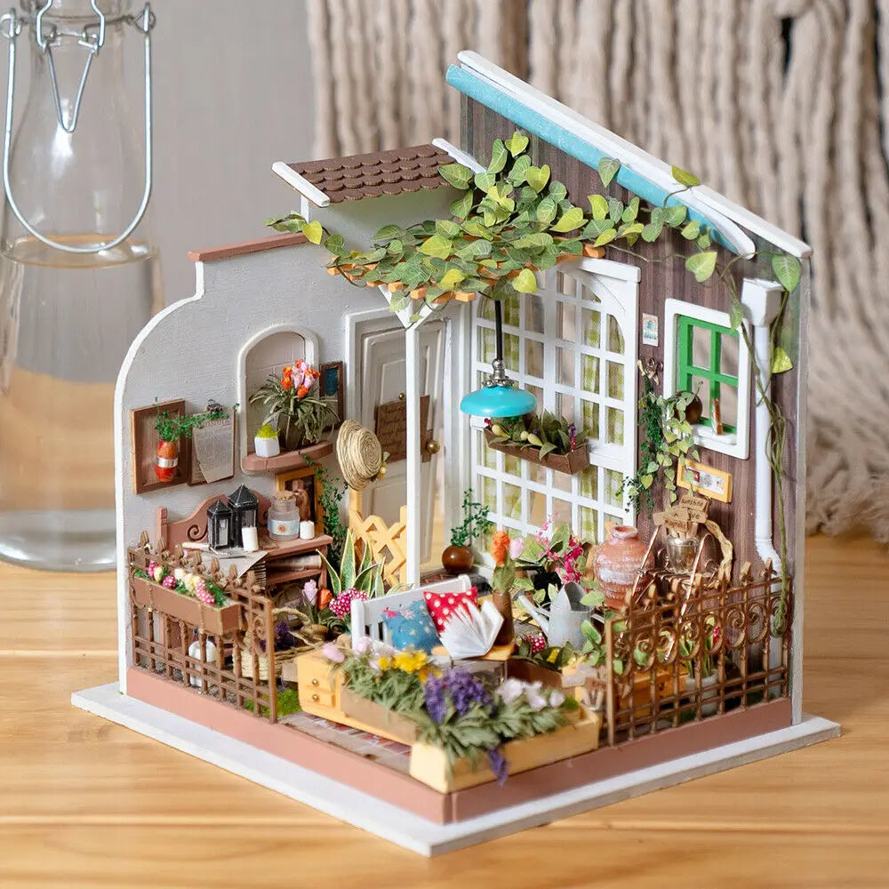 Un kit de serre et de jardin miniature détaillé pour poupées.