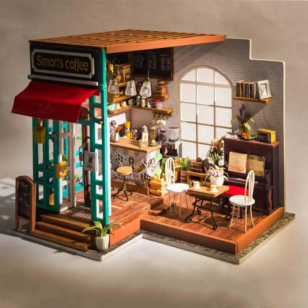 Une maquette de café et de librairie miniature à monter soi-même.