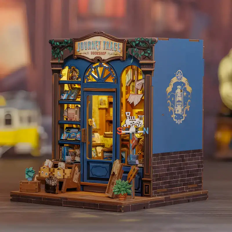 Une librairie bleue miniature illuminée avec des détails complexes.