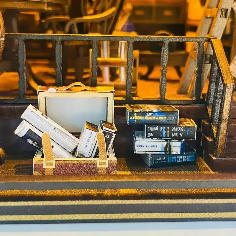 Diorama miniature d’une bibliothèque ou d’un bureau avec des livres et des meubles minuscules