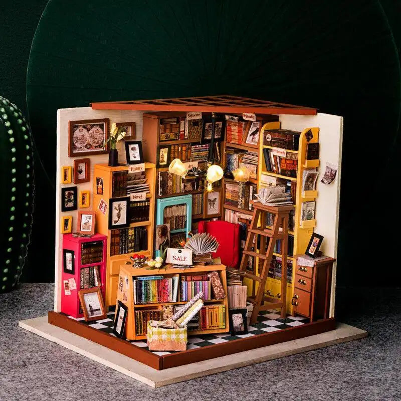 Un kit de librairie miniature à monter soi-même avec de nombreuses étagères, des livres et des éléments décoratifs.