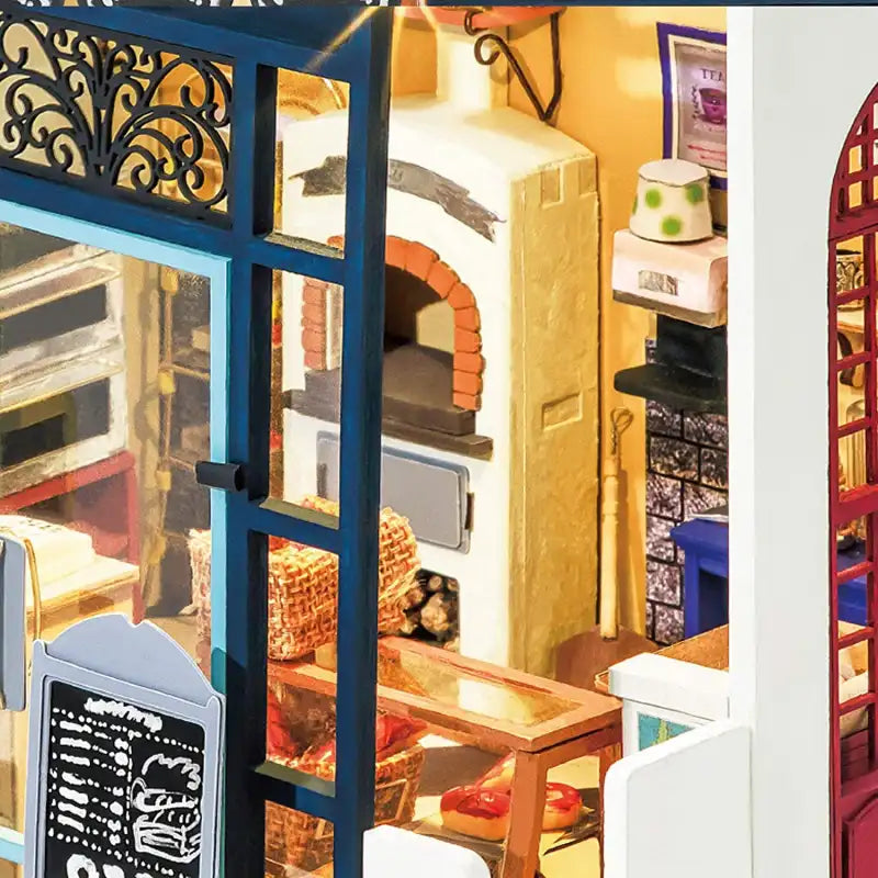 Intérieur d’une boulangerie miniature avec un four et des vitrines