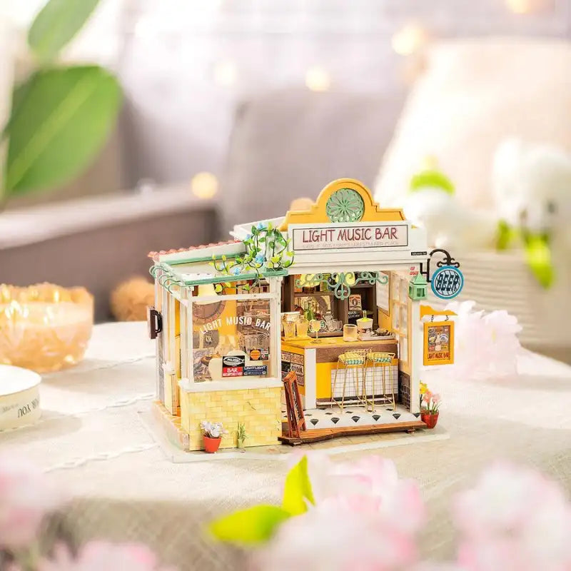 Modèle miniature très détaillé d’un ’Light Music Bar’ à l’intérieur accueillant.