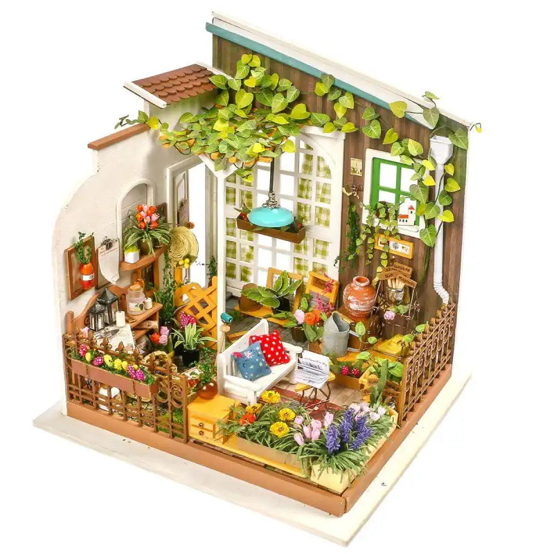 Maison de poupée miniature avec jardin de balcon, détails et accessoires.