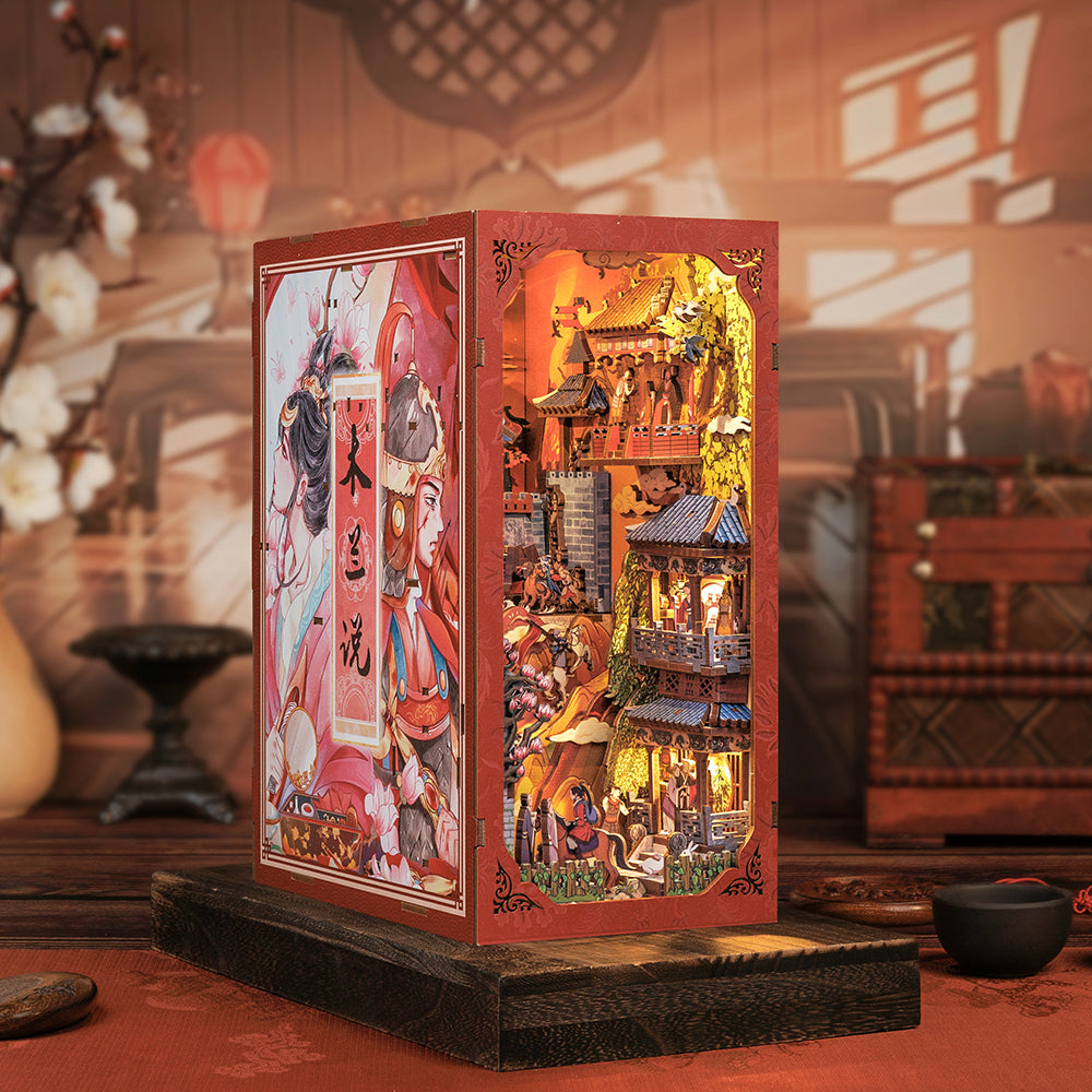 Une bibliothèque diorama illuminée représentant une scène traditionnelle de l’Asie de l’Est.